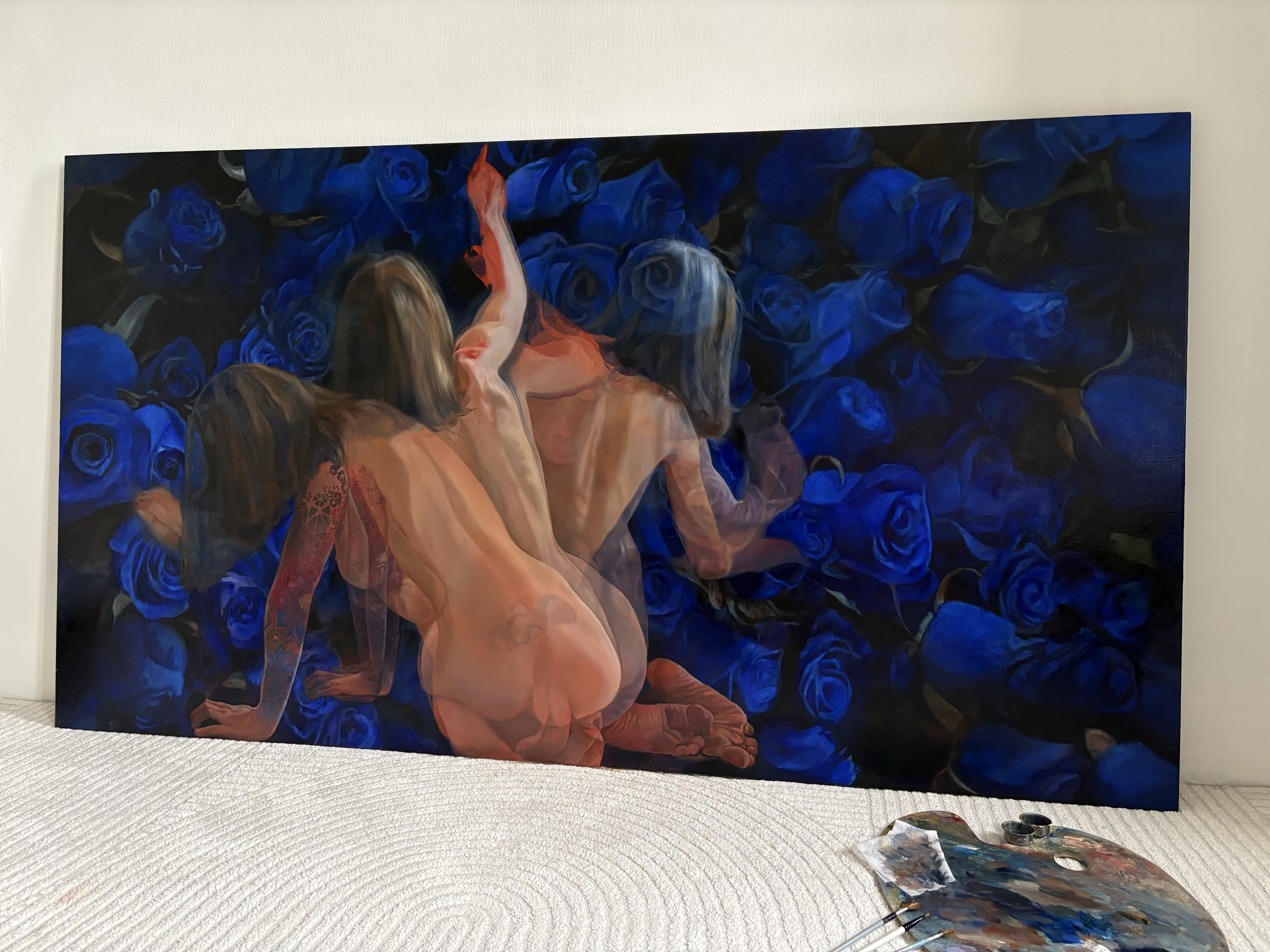 Without Shame: overlapping figures against a field of blue roses